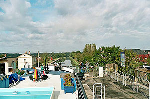 Going through the lock on the canal-bridge at Le Guétin.  Copyright Cold Spring Press 2009.  All rights reserved.