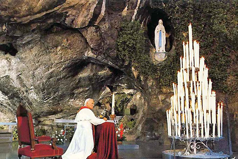 Pope John Paul II at Grotto of Masabielle 2004.  Wikipedia