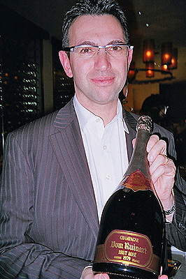 Frederic Panayotis with magnum of Dom Ruinart Brut Ros 1979. Copyright Panos Kakaviatos 2008.  All Rights Reserved.