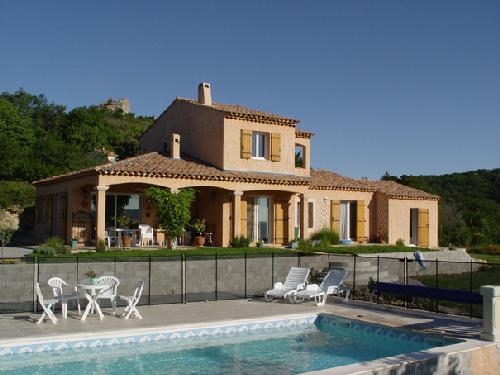 A recently built Provenal mas at Verngues, with the 11th century castle keep peeking over its shoulder.