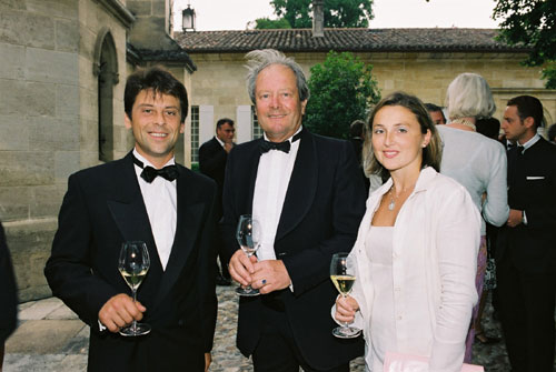 Chateau La Gaffelire owner, Leo de Malet-Roquefort (center),  at the chteau's reception sipping Dom Perignon 1988 / Photo credit:  Groupement de 1er Grands Crus de Saint Emilion